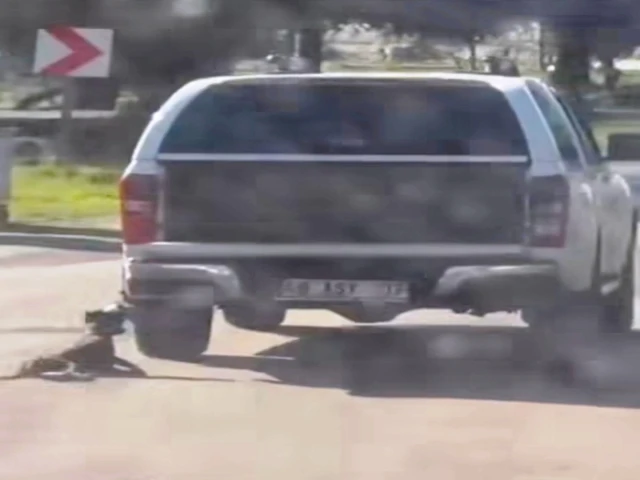 Köpeği aracın Arkasına bağlayarak sürükleyen şüpheliler T.G. (50) ve M.Y. (33) araçla birlikte yaka